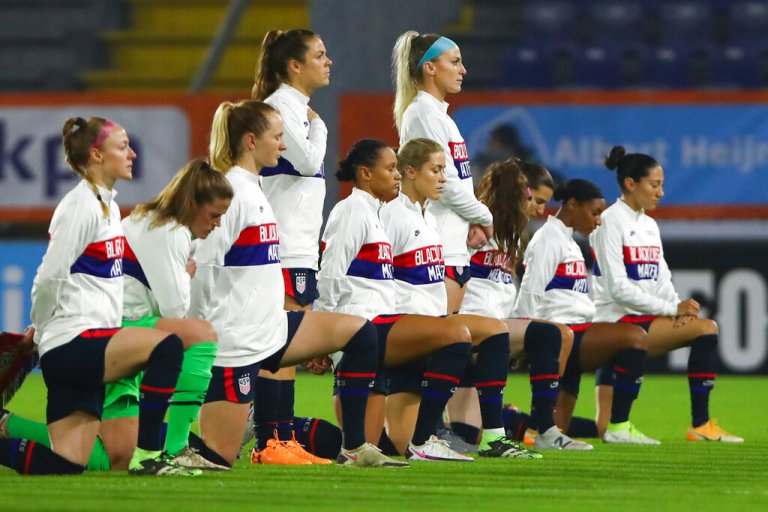 US women’s soccer team wears Black Lives Matter jackets and kneels for national anthem before game in Europe