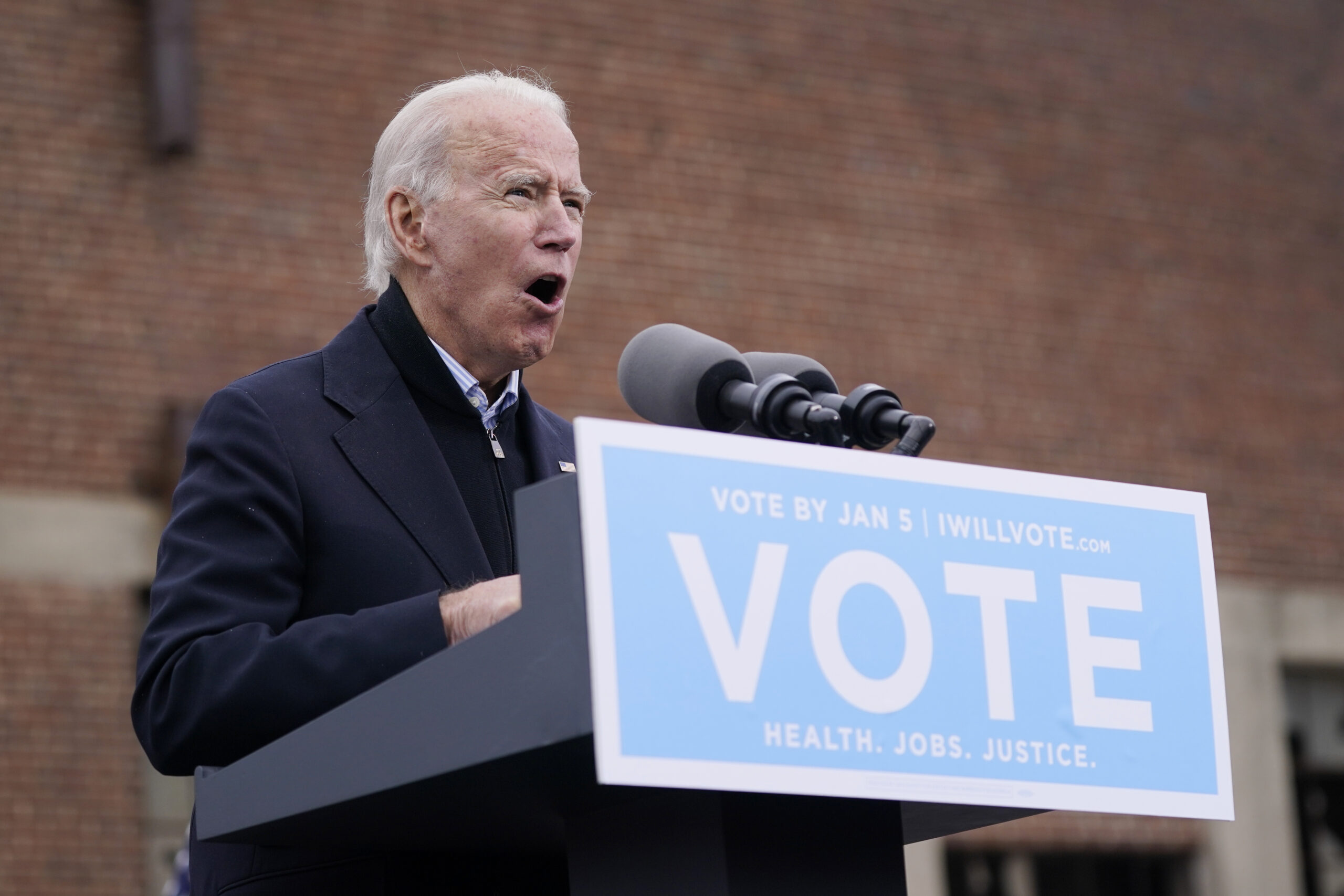 Biden knocks Georgia GOP candidates Perdue and Loeffler for their support of Trump