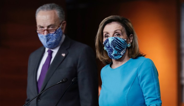 Speaker of the House Nancy Pelosi, D-Calif., and Senate Minority Leader Chuck Schumer, D-N.Y., meet with reporters on Capitol Hill in Washington, Thursday, Nov. 12, 2020.