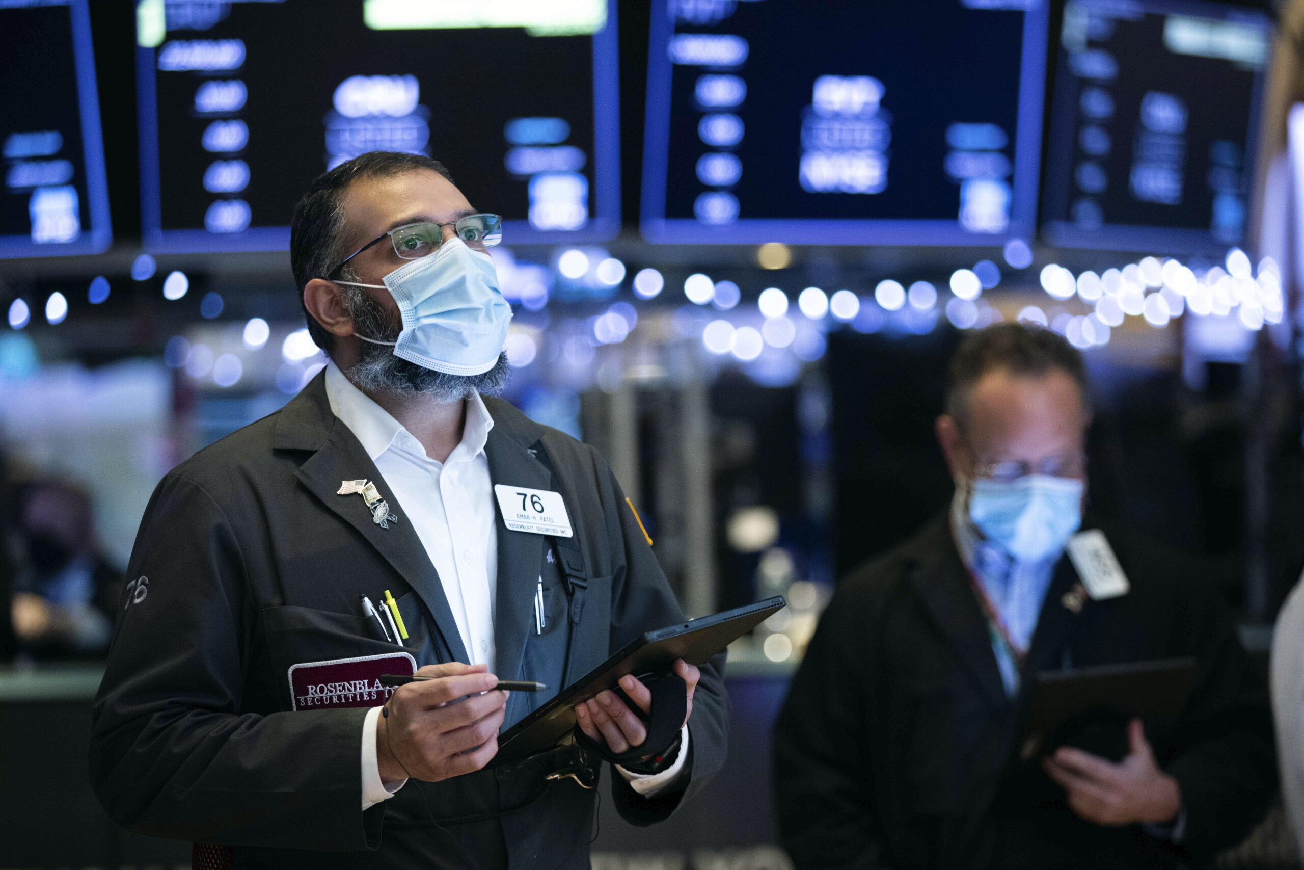 Dow hits all-time high as investors eye Georgia