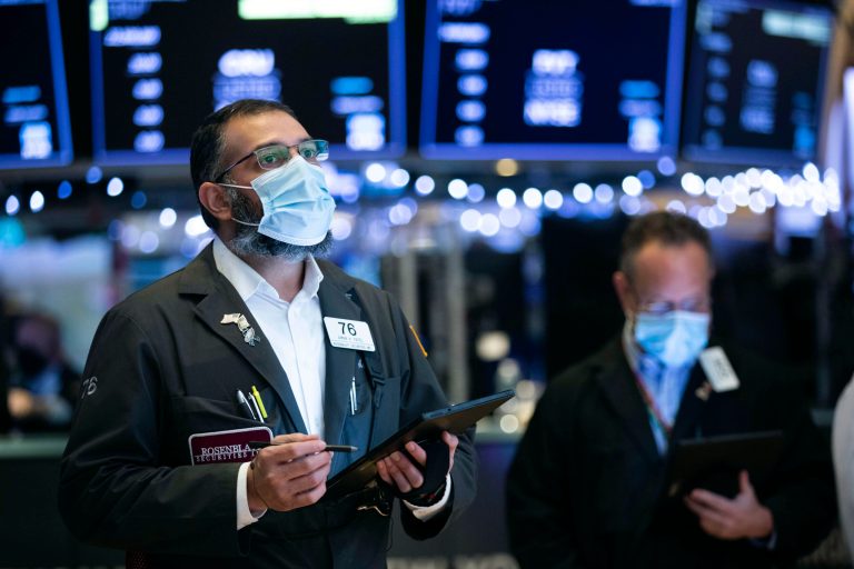 Dow hits all-time high as investors eye Georgia