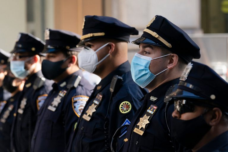 Six people arrested after demonstrators deface monument and clash with police in New York City