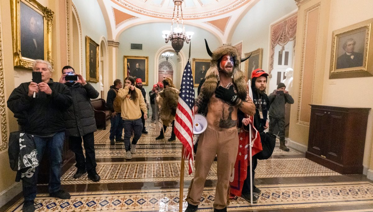 Man arrested for allegedly storming Capitol in fur, horns, and face ...