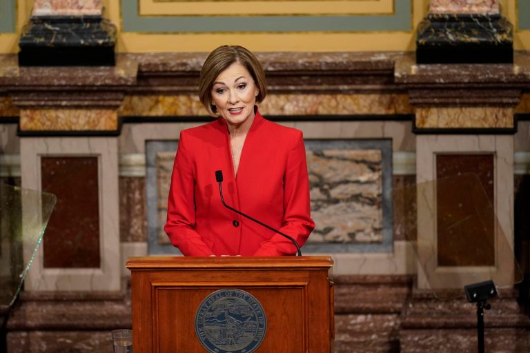 Iowa governor signs bill shortening window for early and Election Day voting