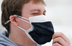 UK infectious disease expert advises people wear masks with three layers