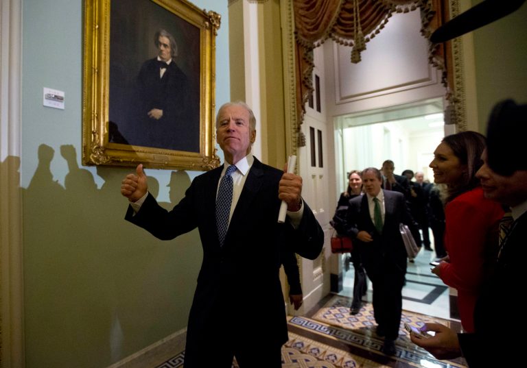 In this Dec. 31, 2012, file photo Vice President Joe Biden gives two thumbs up following a Senate Democratic caucus meeting about the fiscal cliff on Capitol Hill in Washington.