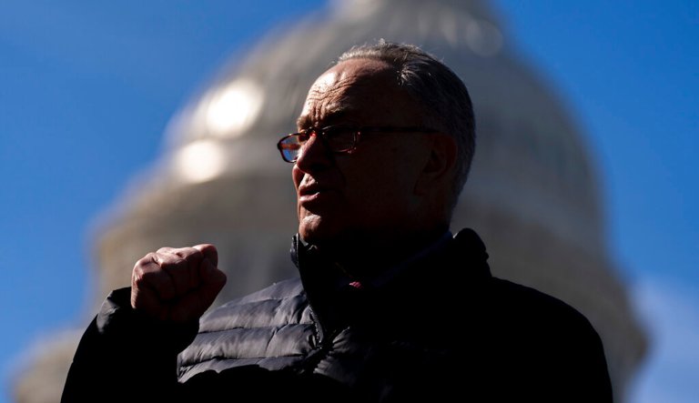 Senate Majority Leader Sen. Chuck Schumer of N.Y., speaks at a news conference on Capitol Hill in Washington, Thursday, Feb. 4, 2021, about plans to reintroduce a resolution to call on President Biden to take executive action to cancel up to $50,000 in debt for federal student loan borrowers.