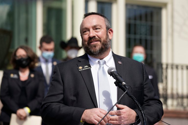 House Minority Leader Hugh McKean speaks during a news conference outside the Governor's mansion Wednesday, March 10, 2021, in Denver. 