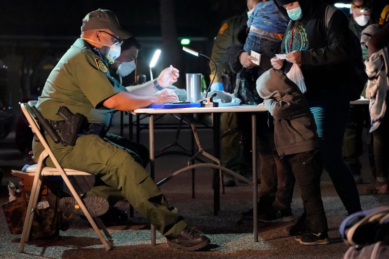 Shocking video: Migrants housed under a bridge and fenced in