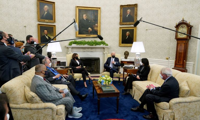 President Joe Biden and Vice President Kamala Harris meet with lawmakers to discuss the American Jobs Plan in the Oval Office of the White House, Monday, April 12, 2021, in Washington.