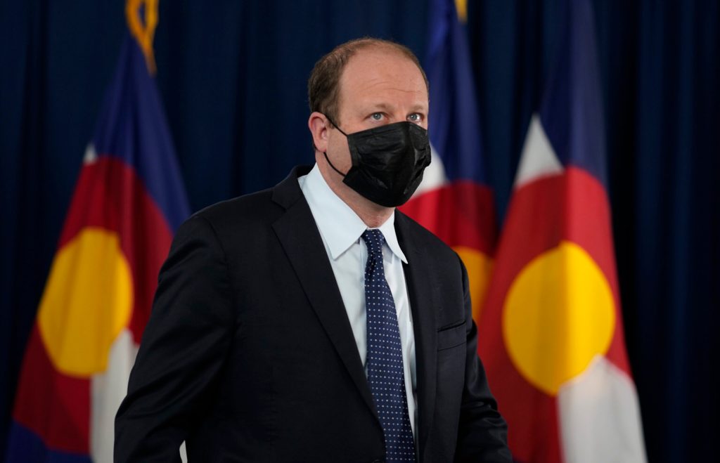 Colorado governor signs bills adding new gun-theft reporting and gun storage requirements