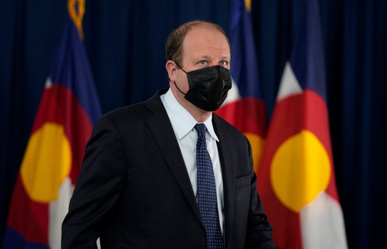 Colorado governor signs bills adding new gun-theft reporting and gun storage requirements