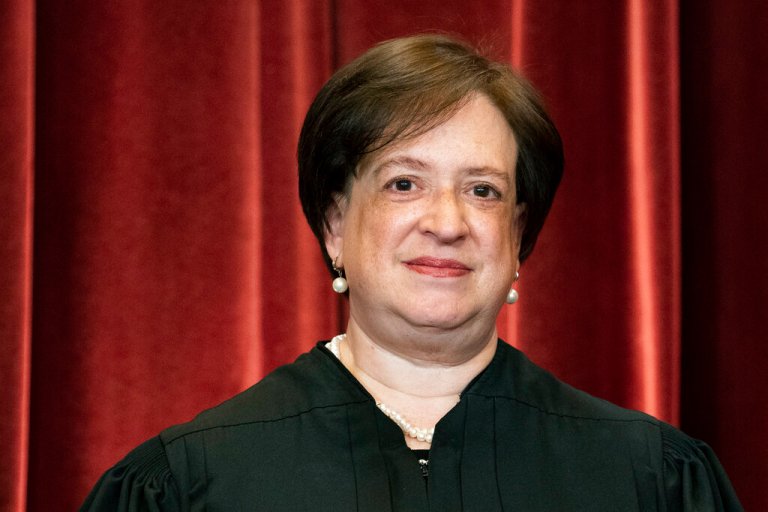 Associate Justice Elena Kagan stands during a group photo at the Supreme Court in Washington, Friday, April 23, 2021.