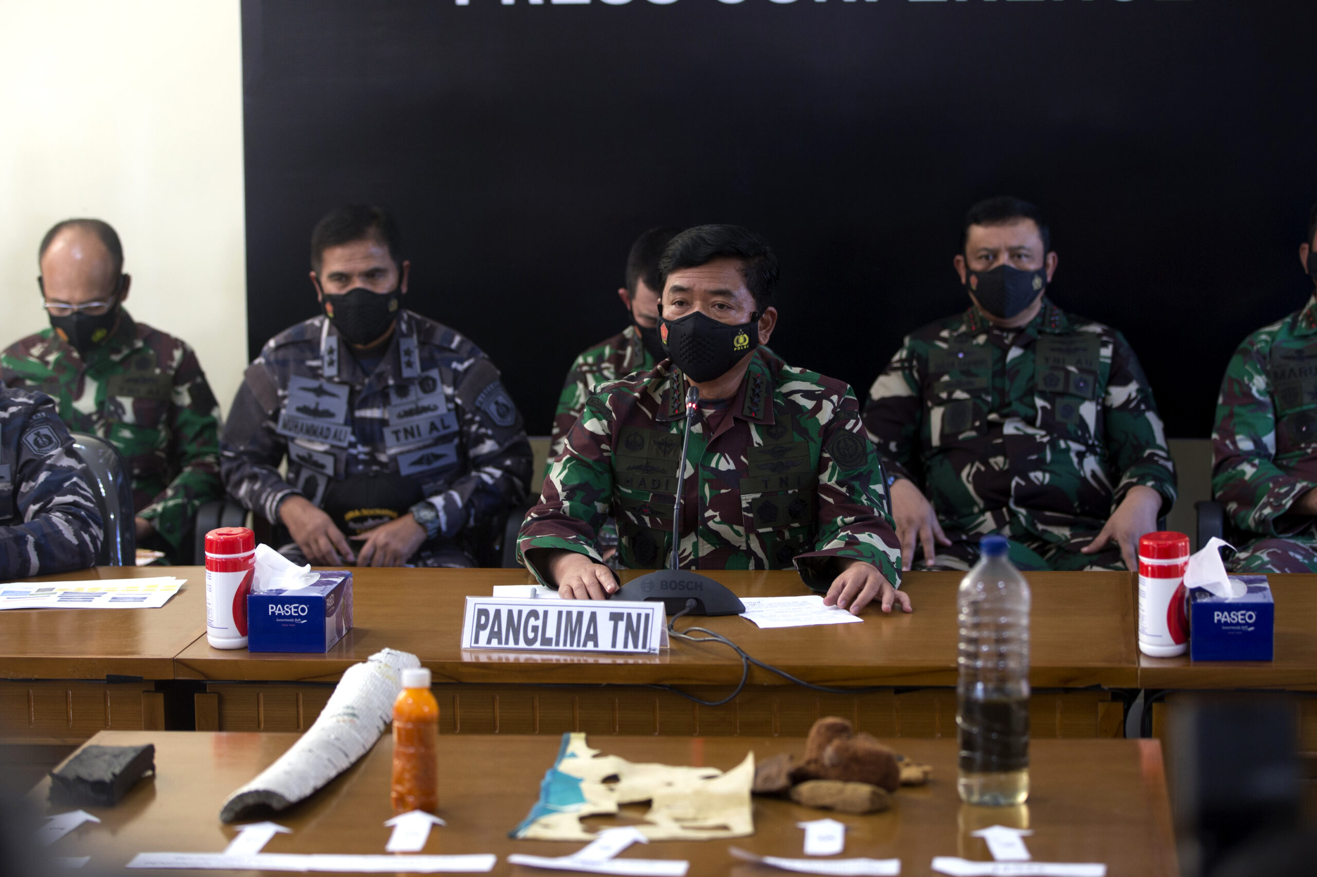 Indonesian navy finds debris from submarine, believes it cracked