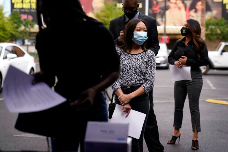 Jobless claims fall below 200,000 for first time since September
