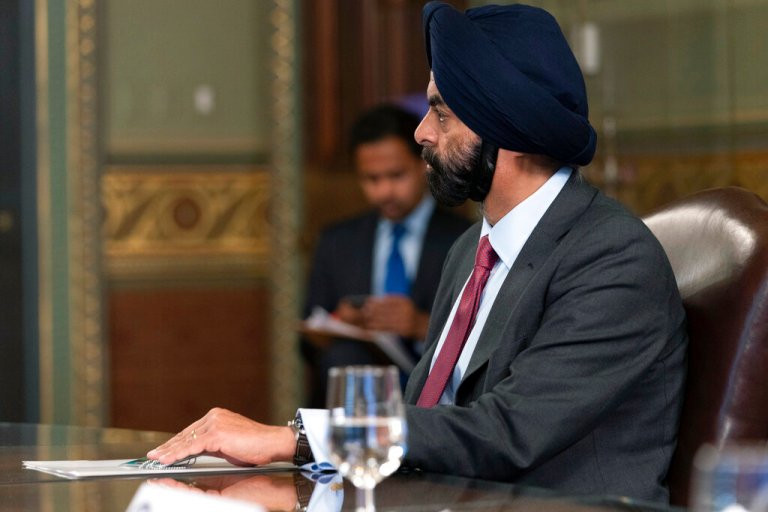 Ajay Banga, chairman of Mastercard, listens during a meeting with Vice President Kamala Harris and business CEO's about economic development in the Northern Triangle, Thursday, May 27, 2021, from Harris' ceremonial office on the White House complex in Washington. 