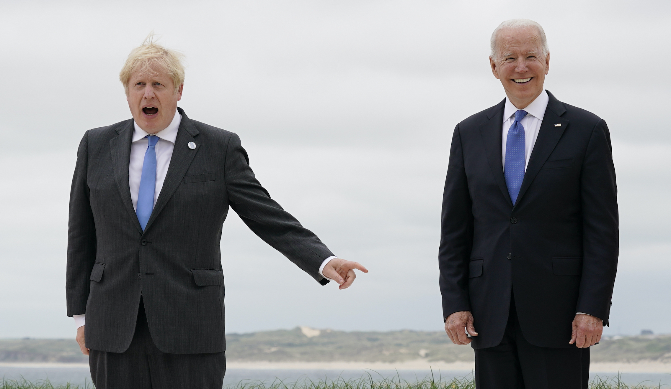 Boris Johnson laments G-7 ‘media circus’ as grinning Biden looks on