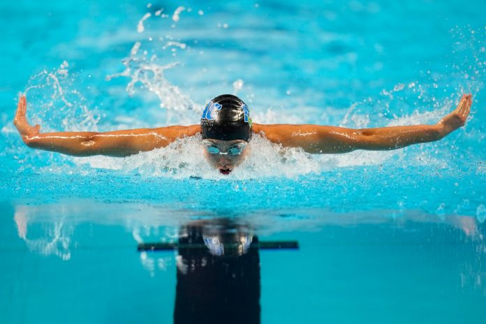 Virginia swimmer beats Olympic record at US trials