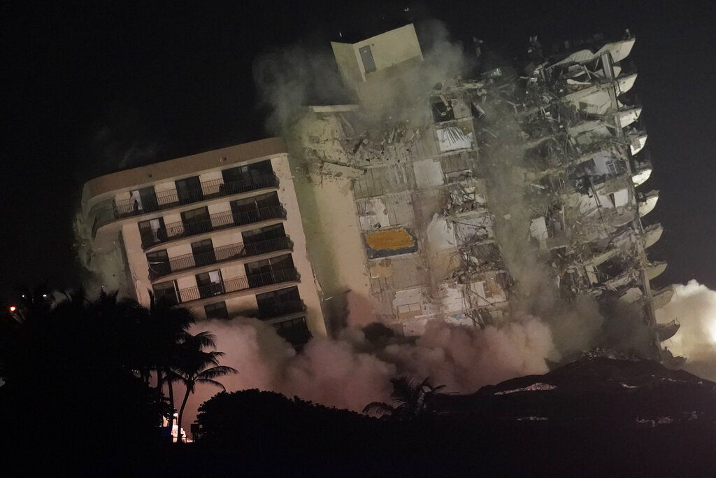 Explosives set off to bring down rest of collapsed condo