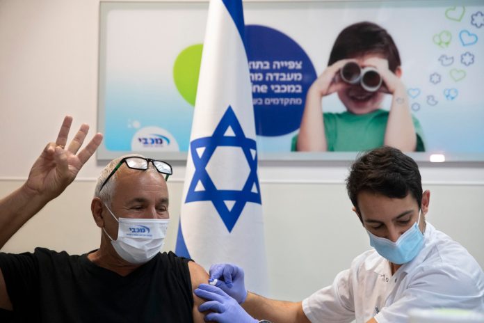 Biden administration slow to embrace booster shots as other countries forge ahead