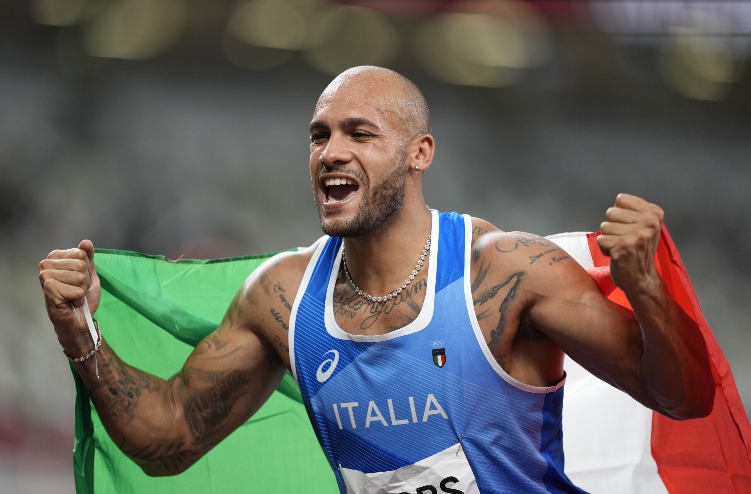Italian Jacobs takes surprising gold in Olympic 100