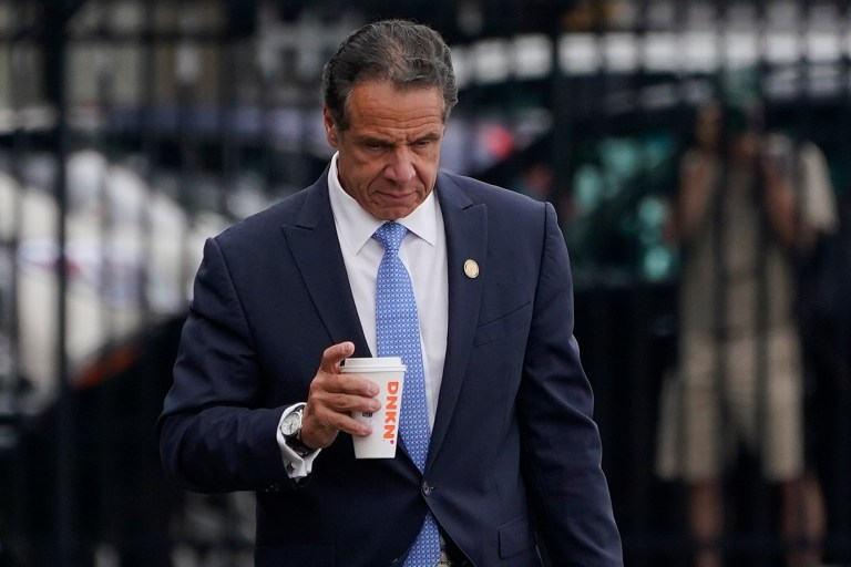 New York Gov. Andrew Cuomo prepares to board a helicopter after announcing his resignation, Tuesday, Aug. 10, 2021, in New York. Cuomo says he will resign over a barrage of sexual harassment allegations. The three-term Democratic governorâs decision, which will take effect in two weeks, was announced Tuesday as momentum built in the Legislature to remove him by impeachment. 