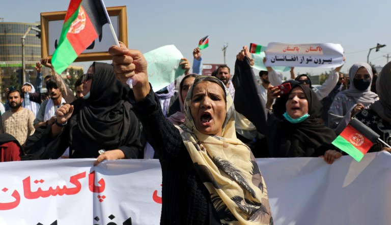 Afghan women shout slogans during an anti-Pakistan demonstration, near the Pakistan embassy in Kabul, Afghanistan, Tuesday, Sept. 7, 2021.