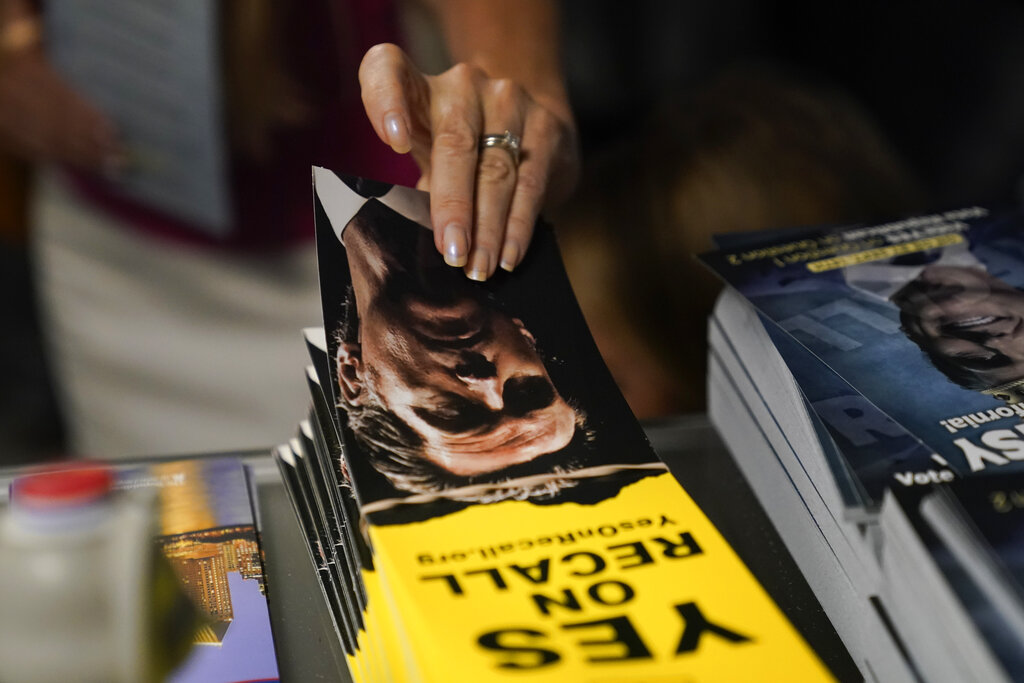 Frustrated LA voters given provisional ballots after equipment glitch in recall election