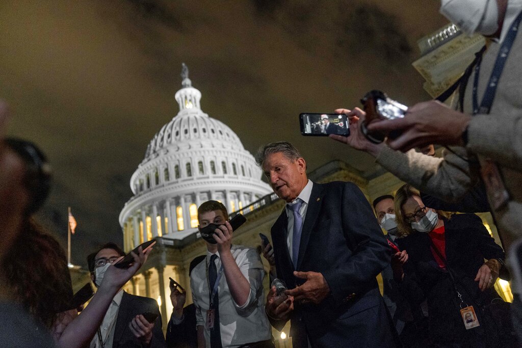 Manchin under intense pressure in West Virginia over filibuster and voter ID