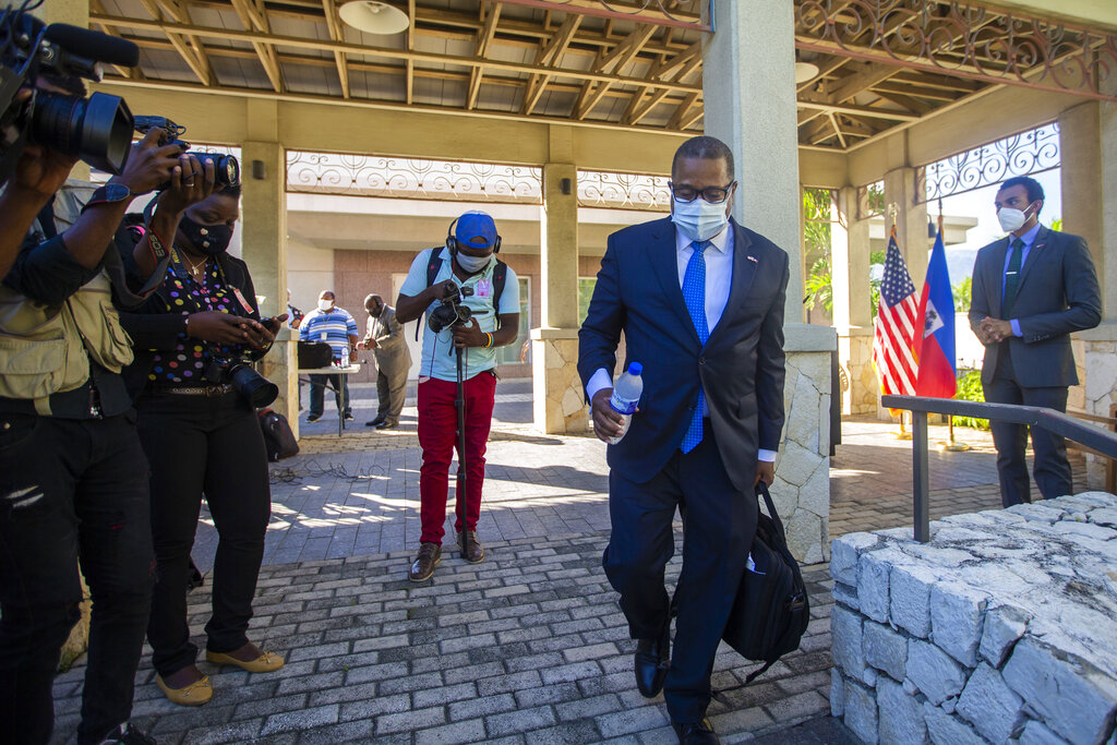 Biden aides dispatched to Haiti for listening tour as 60,000 migrants head toward border