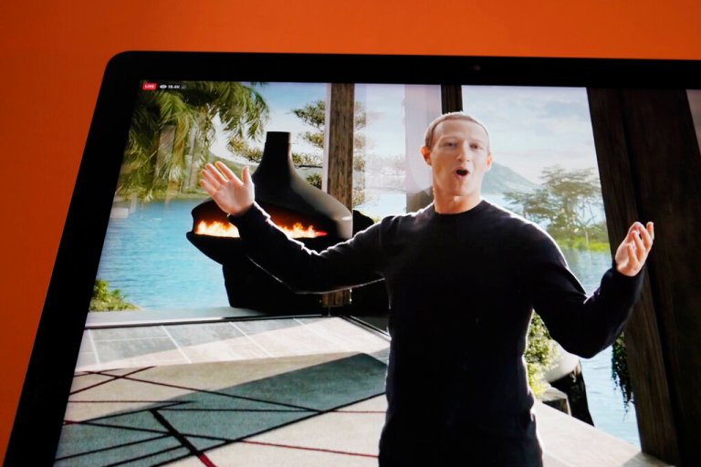Seen on the screen of a device in Sausalito, Calif., Facebook CEO Mark Zuckerberg delivers the keynote address during a virtual event on Thursday, Oct. 28, 2021. Zuckerberg talked up his latest passion -- creating a virtual reality 