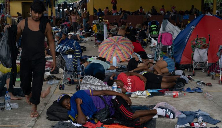 Migrant caravan delayed in Mexico by shooting and suspected Dengue fever outbreak