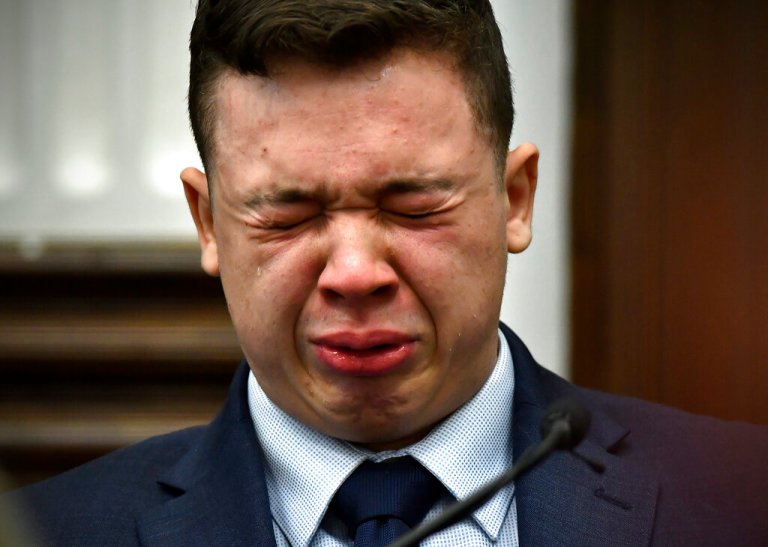 Kyle Rittenhouse breaks down on the stand during his trial at the Kenosha County Courthouse in Kenosha, Wisconsin, on Wednesday. Rittenhouse is accused of killing two people and wounding a third during a protest over police brutality in Kenosha last year.  
