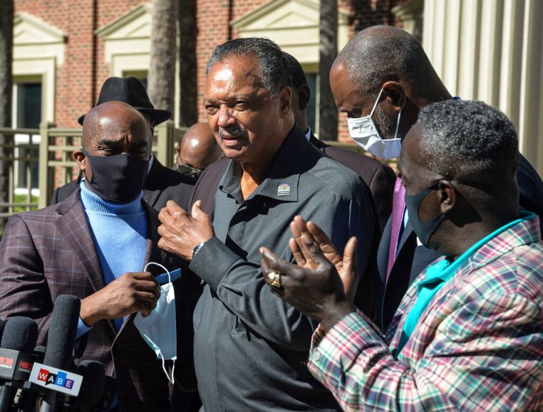 The Rev. Jesse Jackson enters the Glynn County Courthouse in Brunswick, Georgia.