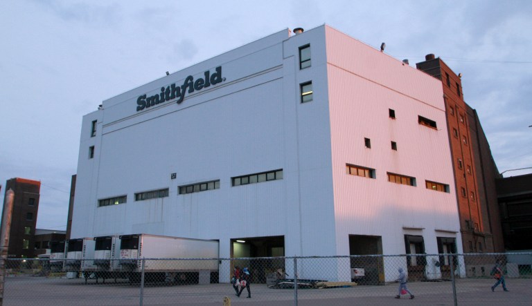 Employees of two departments at the Smithfield pork processing plant in Sioux Falls, S.D. report to work on Monday, May 4, 2020, as the plant moved to reopen after a  coronavirus outbreak infected workers.