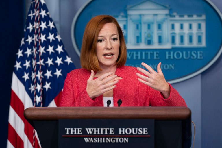 White House defends Biden travel ban after digs against Trump