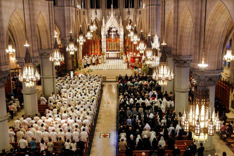 Congregants including rows of priests, left, attend a Mass at Cathedral Basilica of the Sacred Heart in Newark, N.J.