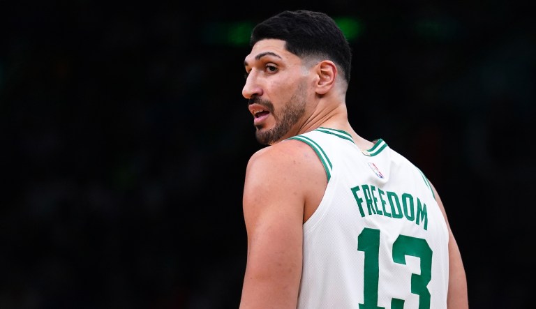 Boston Celtics center Enes Kanter Freedom, looks towards his teamâs bench during the first half of an NBA basketball game, Wednesday, Dec. 1, 2021, in Boston. The Boston Celtics center changed his name from Enes Kanter to Enes Kanter Freedom in celebration of him officially becoming a United States citizen on Monday.