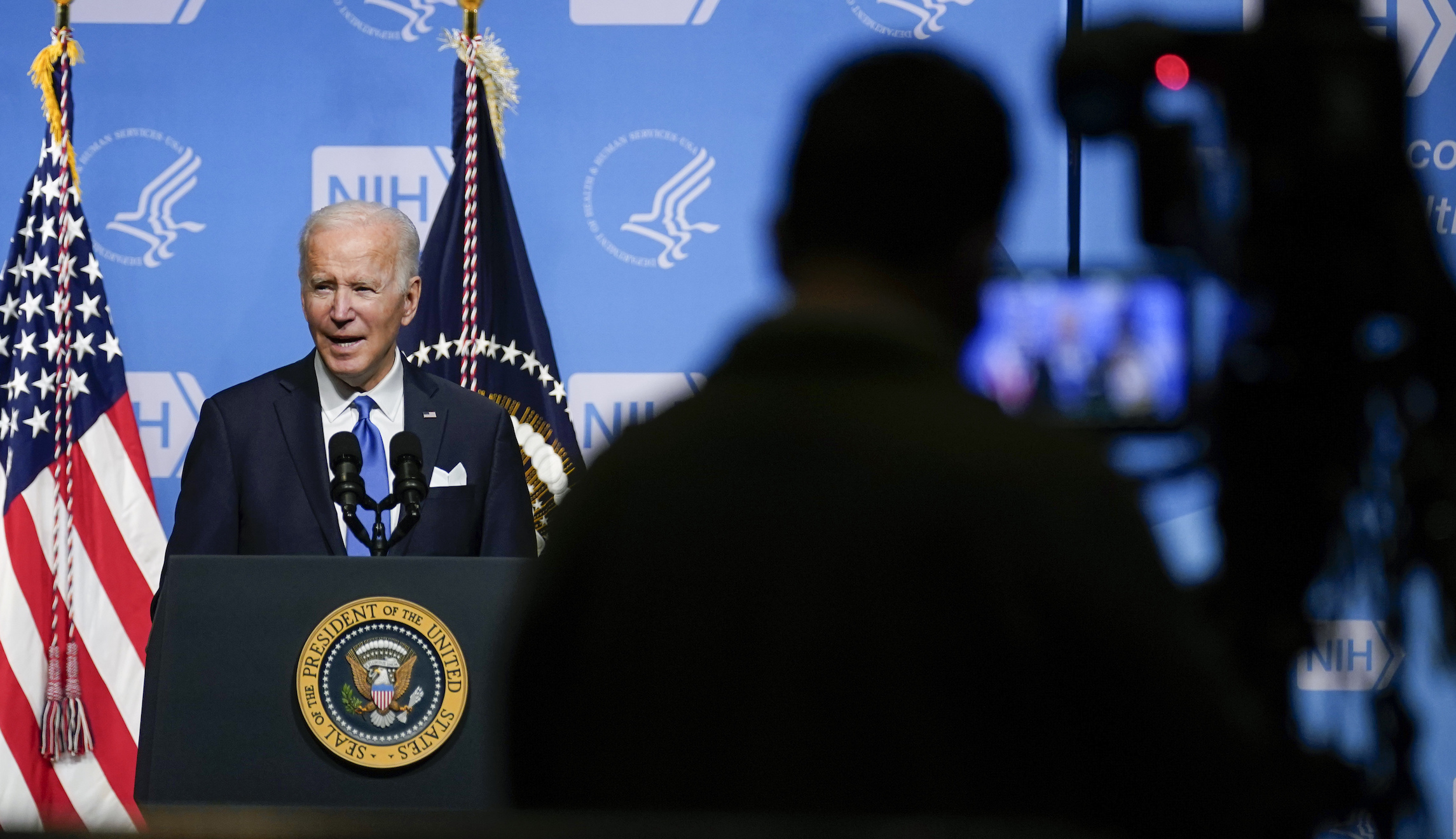 With lingering threat, COVID-19 may come back to bite Biden