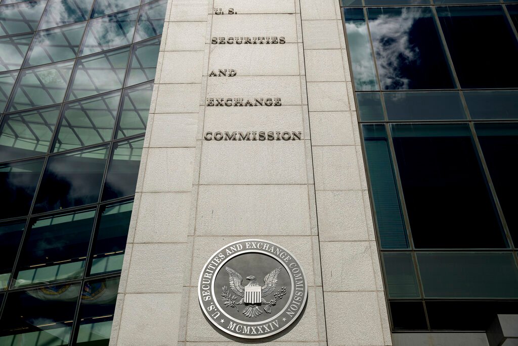 Ernst & Young to pay SEC $100 million for employees cheating on CPA ethics exams