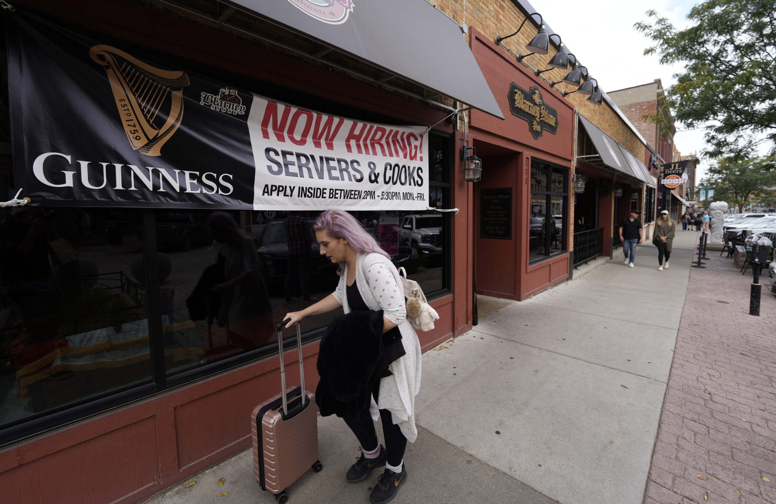 Layoffs fell to record low in December as desperate businesses held on to workers