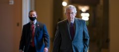 McConnell intensifies courting of Manchin to join GOP
