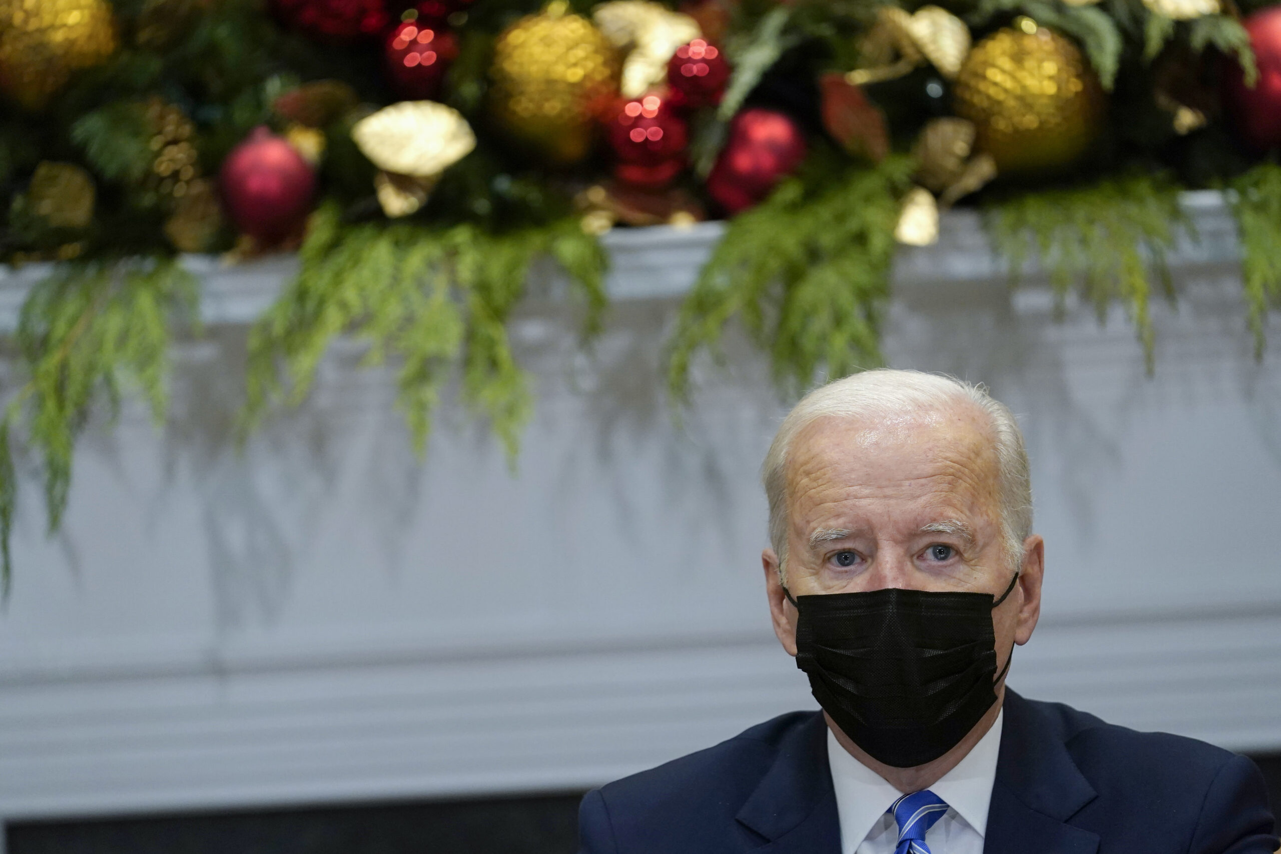 Biden and Democrats grapple with big spending bill slipping into 2022
