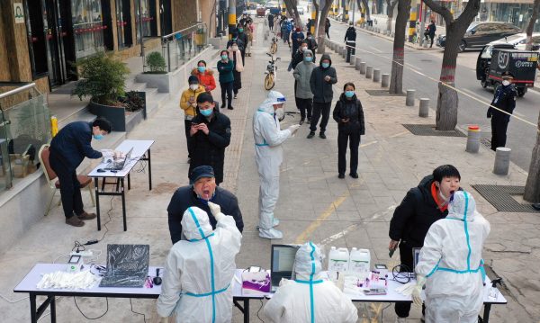 Chinese lab manager detained on suspicion of causing spread of COVID-19