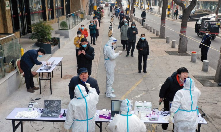 Chinese lab manager detained on suspicion of causing spread of COVID-19