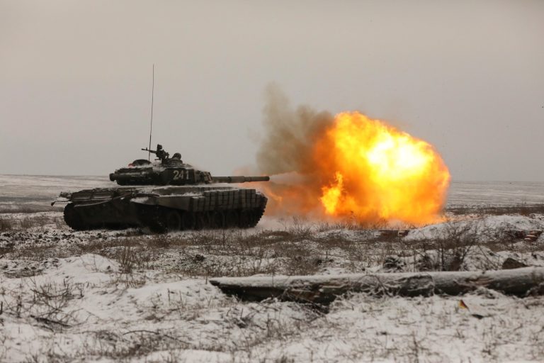 A Russian tank T-72B3 fires as troops take part in drills at the Kadamovskiy firing range in the Rostov region in southern Russia, on Jan. 12, 2022. 