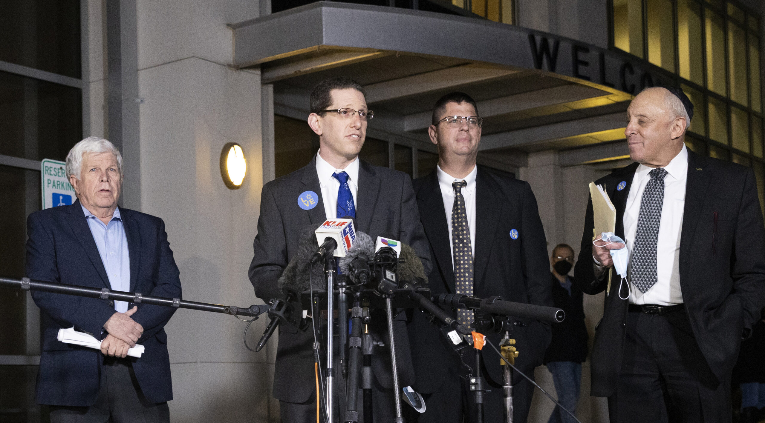 ‘We’ll get through this’: Rabbi who was held hostage leads prayer service