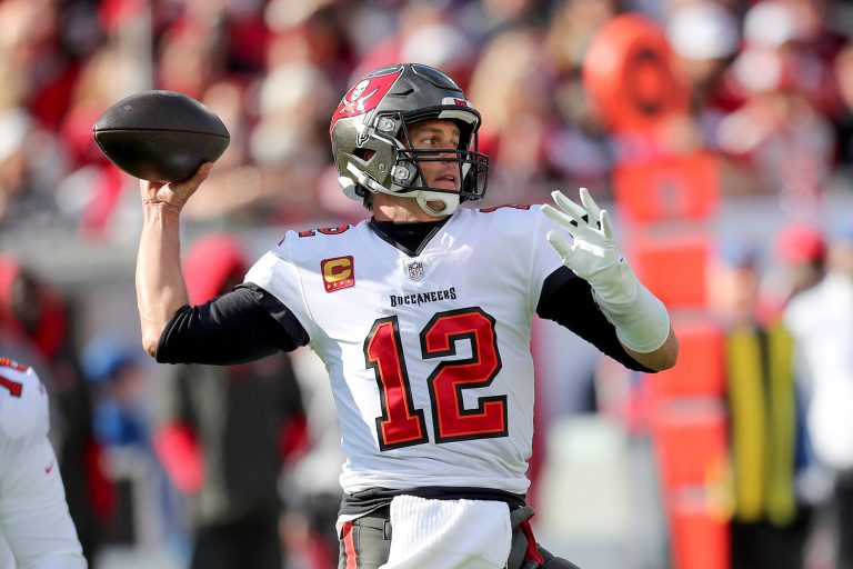Tampa Bay Buccaneers quarterback Tom Brady (12) attempts a pass during an NFL divisional playoff football game between the Los Angeles Rams and Tampa Bay Buccaneers Sunday, January 23, 2022, in Tampa, Florida.