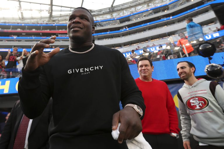 Former San Francisco 49ers running back Frank Gore watches players warm up before the NFC Championship NFL football game between the Los Angeles Rams and the 49ers Sunday, Jan. 30, 2022, in Inglewood, California. 