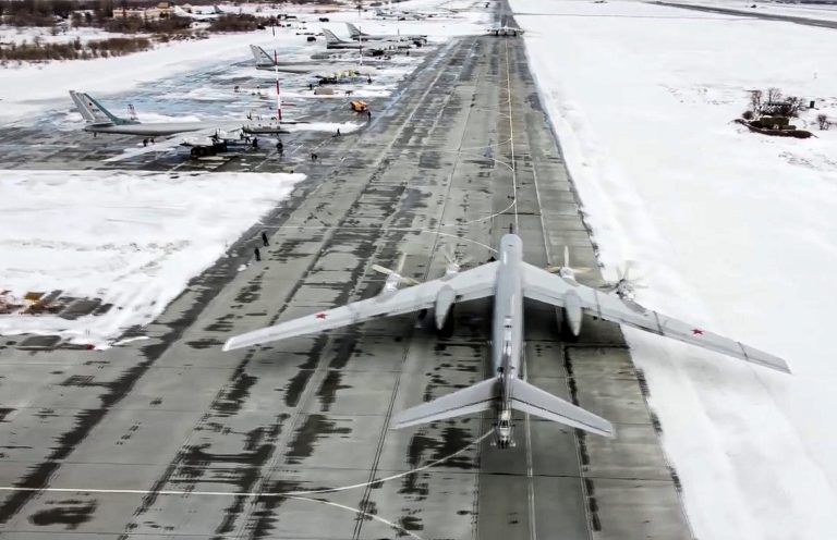 FILE - In this image from video provided by the Russian Defense Ministry Press Service, a Tu-95 strategic bomber from the Russian air force prepares to take off from an air base in Engels near the Volga River in Russia, Monday, Jan. 24, 2022. (Russian Defense Ministry Press Service via AP, File)